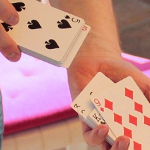 Peter performing card tricks in spain